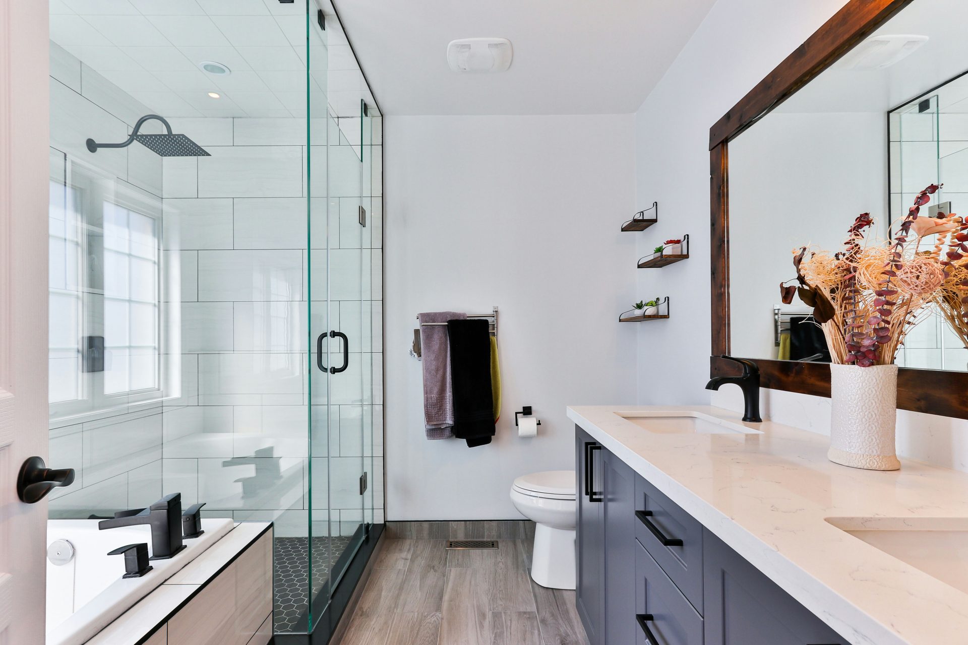Bright bathroom with sleek design and shower.