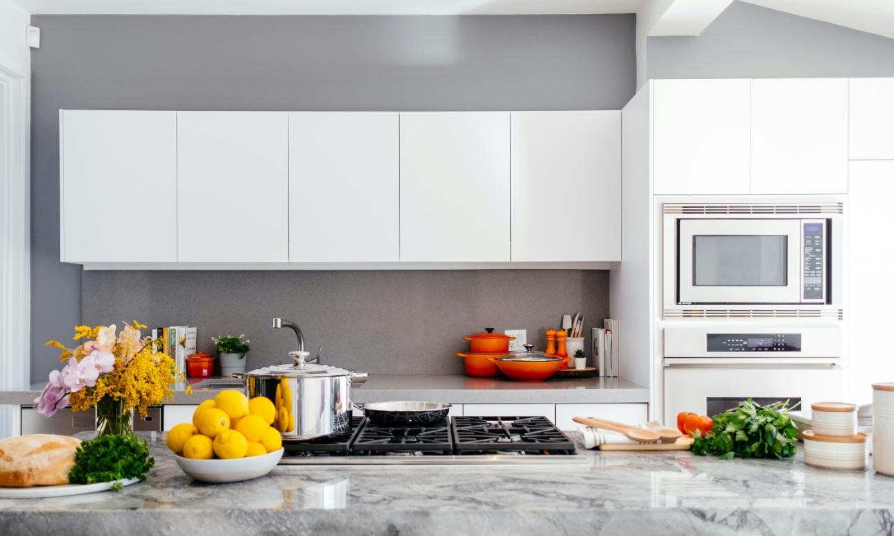 Contemporary kitchen with modern appliances and decor.